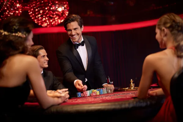 A confident dealer surrounded by casino chips inviting players to access their JEETA account, reflecting quick and easy login options.